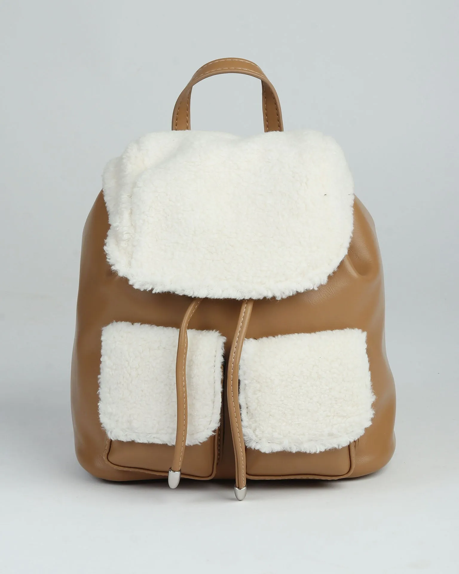 Faux shearling and leather backpack